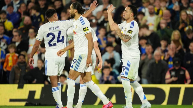 Leeds United's Noah Okafor, right, celebrates with teammates after scoring their side's second goal during the Premier League match between Leeds United and Burnley, in Leeds, England, Friday, May 1, 2026. (Martin Rickett/PA via AP)