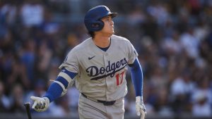 Los Angeles Dodgers' Shohei Ohtani watches his home run during the first inning of a baseball game against the San Diego Padres Wednesday, May 20, 2026, in San Diego. (Gregory Bull/AP)