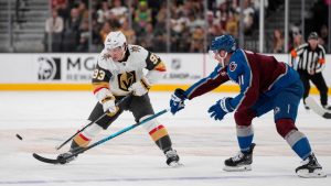 Vegas Golden Knights right wing Mitch Marner (93) skates the puck upice against Colorado Avalanche center Brock Nelson (11) during the second period of an NHL hockey game Friday, Oct. 31, 2025, in Las Vegas. (Lucas Peltier/AP)