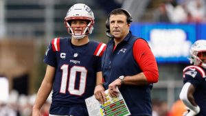 New England Patriots head coach Mike Vrabel stands with quarterback Drake Maye. (Winslow Townson/AP)