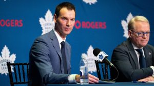 New Toronto Maple Leafs General Manager John Chayka, left, speaks during a press conference, as MLSE President and CEO Keith Pelley looks on in Toronto on Monday, May 4, 2026. (Arlyn McAdorey/CP)