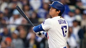 Los Angeles Dodgers' Shohei Ohtani hits a solo home run during the first inning of a baseball game against the Colorado Rockies, Wednesday, May 27, 2026, in Los Angeles. (AP Photo/Mark J. Terrill)