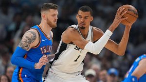 Oklahoma City Thunder center Isaiah Hartenstein (55), defends against San Antonio Spurs forward Victor Wembanyama (1) during the first half of Game 2 in the Western Conference finals NBA basketball playoffs series Wednesday, May 20, 2026, in Oklahoma City. (Tony Gutierrez/AP)