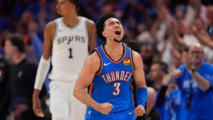Oklahoma City Thunder guard Jared McCain (3) celebrates after making a 3-pointer during the second half of Game 2 in the Western Conference finals NBA basketball playoffs series against the San Antonio Spurs Wednesday, May 20, 2026, in Oklahoma City. (Tony Gutierrez/AP)