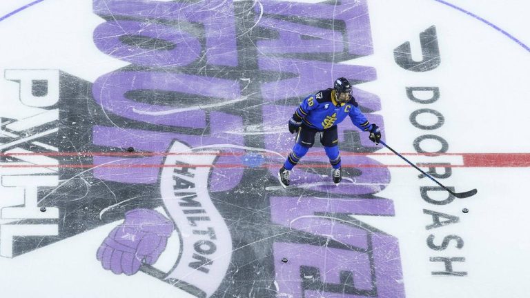 Toronto Sceptres' Blayre Turnbull (40) collects pucks on the PWHL Takeover Tour logo ahead of PWHL action against the Seattle Torrent in Hamilton, Ont., on Saturday, Jan. 3, 2026. (Nick Iwanyshyn/CP)