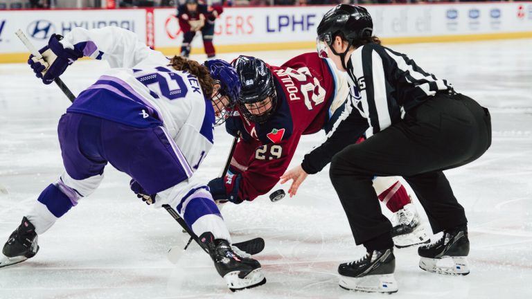 Kelly Pannek and Marie-Philip Poulin faceoff during a regular-season game between the Montreal Victoire and Minnesota Frost in March 2026. (Photo courtesy of the PWHL)