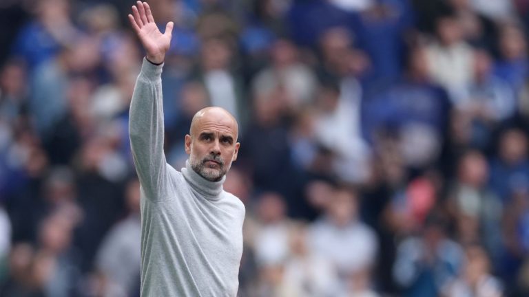 Manchester City's head coach Pep Guardiola greets fans before the English FA Cup final soccer match between Chelsea and Manchester City in London, Saturday, May 16, 2026. (Richard Pelham/AP)
