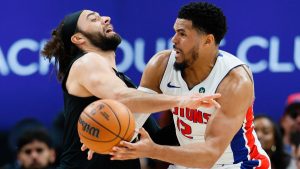 Detroit Pistons forward Tobias Harris (12) is guarded by Cleveland Cavaliers guard Max Strus (2) during the first half in Game 1 of a second-round NBA playoffs basketball series Tuesday, May 5, 2026, in Detroit. (Duane Burleson/AP)