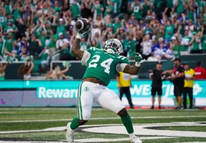 Saskatchewan Roughriders running back Mario Anderson Jr. (24) celebrates after scoring a touchdown against the Winnipeg Blue Bombers during the second half of CFL football action in Regina, Sunday, Aug. 31, 2025. (Heywood Yu/CP)