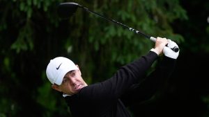 Rory McIlroy, of Northern Ireland, watches his tee shot on the fourth hole during the first round of the PGA Championship golf tournament practice round at Aronimink Golf Club, Thursday, May 14, 2026, in Newtown Square, PA. (AP Photo/Matt Slocum)