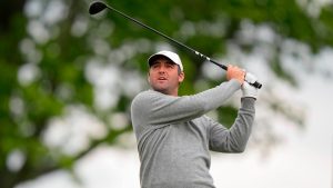 Fans watch Scottie Scheffler hits on the eighth green during the first round of the PGA Championship golf tournament at Aronimink Golf Club, Thursday, May 14, 2026, in Newtown Square, PA. (Frank Franklin II/AP)