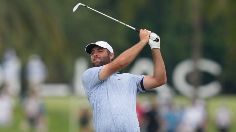 Scottie Scheffler watches his shot on the third hole during the final round of the Cadillac Championship PGA tournament Sunday, May 3, 2026, in Doral, Fla. (David J. Phillip/AP)