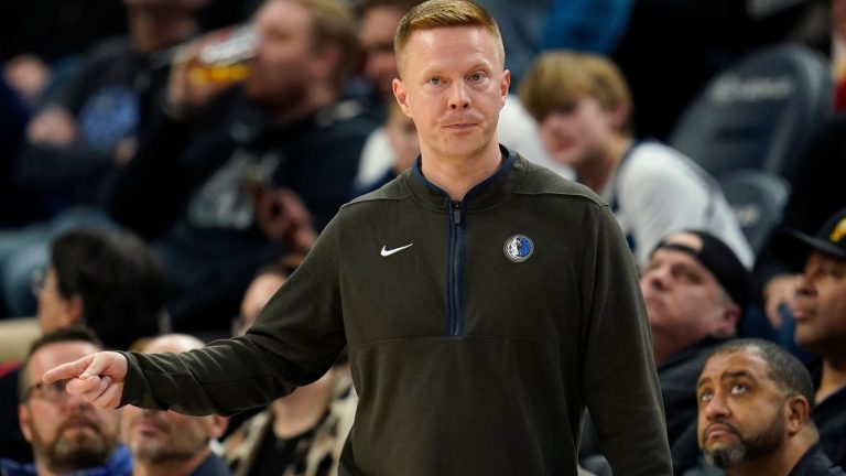 Dallas Mavericks assistant coach Sean Sweeney directs the team during the second half of an NBA basketball game against the Minnesota Timberwolves, Dec. 19, 2022, in Minneapolis. (AP Photo/Abbie Parr, File)