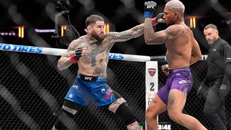 Sean-Brady,-left,-fights-Ecuador's-Michael-Morales,-right,-during-the-first-round-of-a-UFC-welterweight-bout