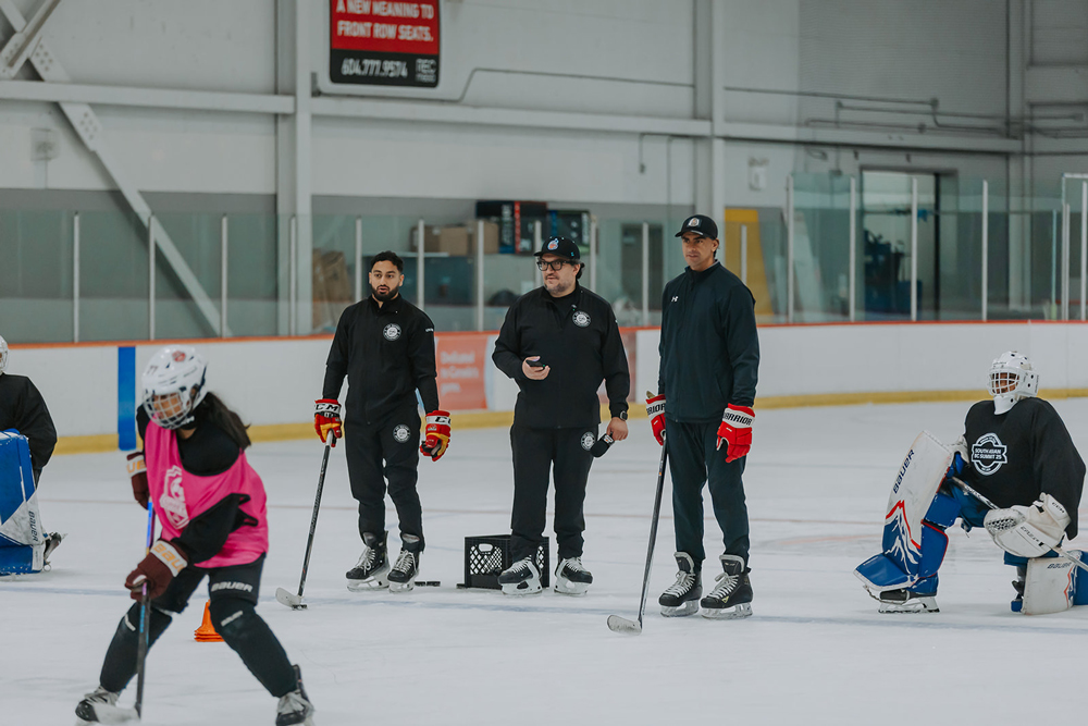 Sekhon helps coach a session for AZ1 Hockey, along with Arjun Atwal (left) and Dampy Brar (right). (Photo courtesy of Sonny Sekhon)