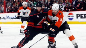 Carolina Hurricanes' Jordan Staal battles Philadelphia Flyers' Jamie Drysdale for the puck during the second period of Game 2 of a Stanley Cup second-round playoff series in Raleigh, N.C., Monday, May 4, 2026. (AP/Karl DeBlaker)