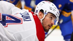 Montreal Canadiens centre Nick Suzuki (14) lines up for a face-off during the second period in Game 1 of a second-round NHL hockey Stanley Cup playoff series against the Buffalo Sabres Wednesday, May 6, 2026, in Buffalo, N.Y. (Jeffrey T. Barnes/AP)