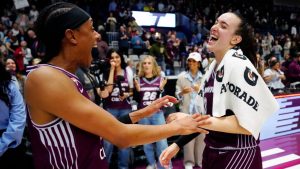 Toronto Tempo's Brittney Sykes (20) and Toronto Tempo's Marina Mabrey (3) celebrate the win over the Seattle Storm during second half WNBA basketball action in Toronto, on Wednesday, May 13, 2026. (Frank Gunn/CP)