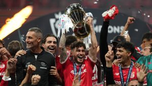 Toluca's Jesus Angulo lifts the trophy after beating Tigres during the Concacaf Champions Cup final soccer match in Toluca, Mexico, Saturday, May 30, 2026. (Fernando Llano/AP)