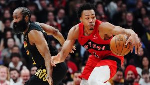 Toronto Raptors' Scottie Barnes (4) drives past Cleveland Cavaliers' James Harden (1) during first half NBA playoff basketball action in Toronto on Friday, May 1, 2026. (Frank Gunn/CP)