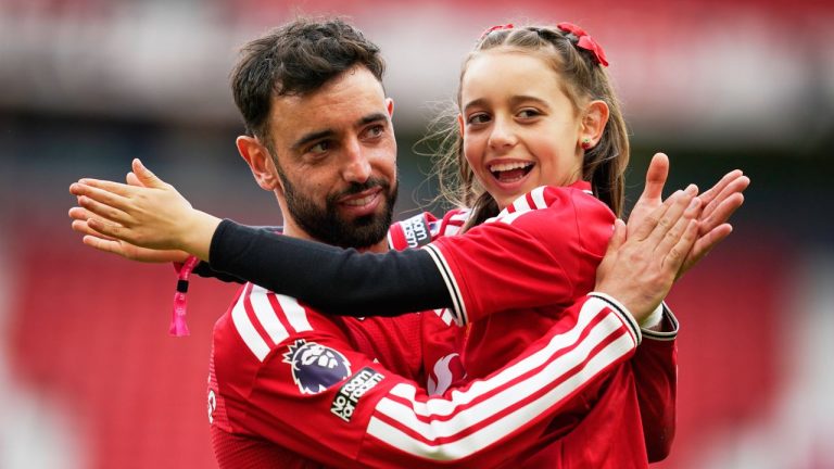Manchester United's Bruno Fernandes plays with his kid after the English Premier League soccer match between Manchester United and Nottingham Forest in Manchester, England, Sunday, May 17, 2026. (Dave Thompson/AP)
