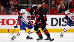 Carolina Hurricanes' Sebastian Aho (20) controls the puck against the Montreal Canadiens during the first period in Game 2 of the Eastern Conference finals NHL hockey Stanley Cup playoffs series in Raleigh, N.C., Saturday, May 23, 2026. (AP Photo/Karl DeBlaker)