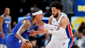 Orlando Magic forward Paolo Banchero, left, drives against Detroit Pistons guard Cade Cunningham, right, during the first half in Game 7 of a first-round NBA basketball playoffs series Sunday, May 3, 2026, in Detroit. (AP Photo/Duane Burleson)
