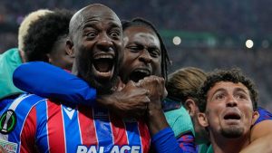 Crystal Palace's Jean-Philippe Mateta celebrates after scoring during the Europa Conference League final soccer match between Crystal Palace and Rayo Vallecano in Leipzig, Germany, Wednesday, May 27, 2026. (AP Photo/Ebrahim Noroozi)