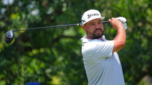 J.J. Spaun watches his tee shot on the ninth hole during the first round of the Charles Schwab Challenge golf tournament at Colonial Country Club in Fort Worth, Texas, Thursday, May 28, 2026. (AP Photo/LM Otero)