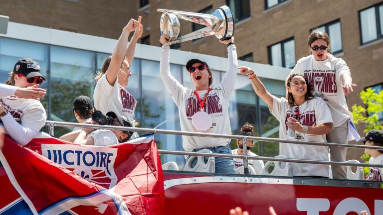 Montreal Victoire goaltender Ann-Renee Desbiens hoists the Walter Cup while surrounded by teammates, during Montreal Victoire's victory celebration in Montreal, on Saturday, May 30, 2026. THE CANADIAN PRESS/Christopher Katsarov