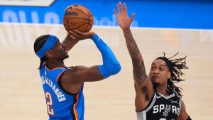 Oklahoma City Thunder guard Shai Gilgeous-Alexander (2) shoots against San Antonio Spurs guard Devin Vassell (24) during the first half of Game 1 in a third-round NBA playoffs series Monday, May 18, 2026, in Oklahoma City. (Nate Billings/AP)