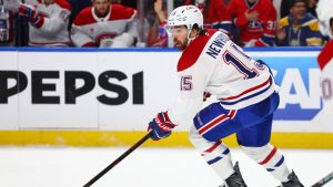 Montreal Canadiens center Alex Newhook (15) carries the puck during the first period in Game 5 of a second-round Stanley Cup playoff series against the Buffalo Sabres Thursday, May 14, 2026, in Buffalo, N.Y. (Jeffrey T. Barnes/AP)