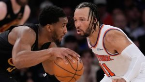 New York Knicks' Jalen Brunson, right, covers Cleveland Cavaliers' Donovan Mitchell, left, during the second half of Game 1 in the Eastern Conference finals NBA playoffs series, Tuesday, May 19, 2026, in New York. (Seth Wenig/AP)