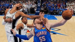San Antonio Spurs forward Victor Wembanyama (1) defends against Oklahoma City Thunder center Isaiah Hartenstein (55) during the second half of Game 2 in the Western Conference finals NBA basketball playoffs series Wednesday, May 20, 2026, in Oklahoma City. (Nate Billings/AP)