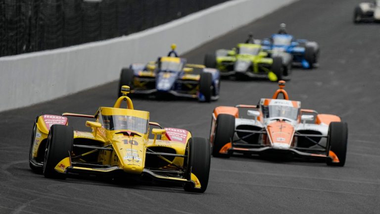 Alex Palou, of Spain, leads a pack of cars during practice for the Indianapolis 500 auto race at the Indianapolis Motor Speedway in Indianapolis, Monday, May 18, 2026. (Michael Conroy/AP)