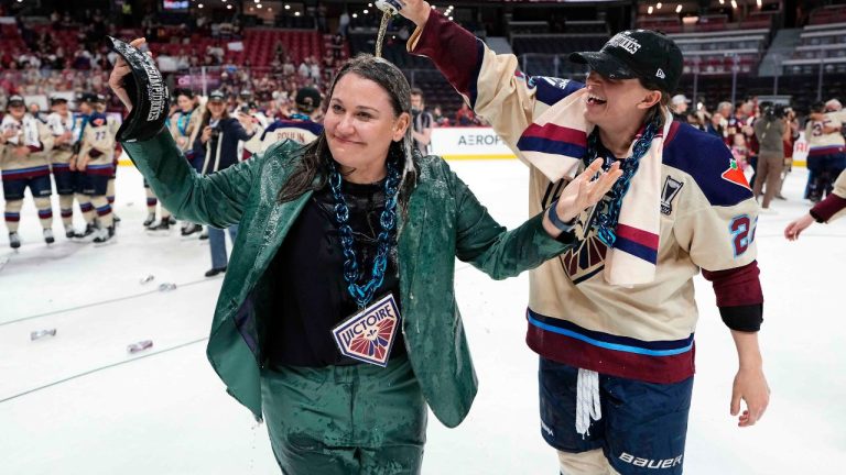 Montreal Victoire's Jessica DiGirolamo pours a beer on head coach Kori Cheverie as they celebrate the team's PWHL Walter Cup win against the Ottawa Charge, in Ottawa, on Wednesday, May 20, 2026. (Justin Tang/CP)