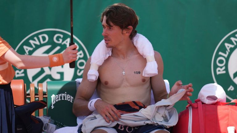 Alex De Minaur of Australia attends a break during the first round men's singles tennis match against Toby Samuel of Britain at the French Open in Paris, Monday, May 25, 2026. (Christophe Ena/AP)
