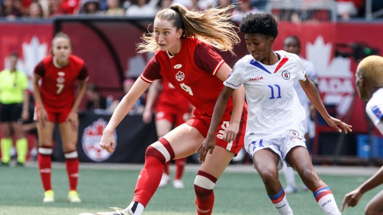 Canada's Jordyn Huitema makes the pass against Haiti Roseline Éloissant during second half soccer action in Winnipeg, Saturday, May 31, 2025. (John Woods/CP)
