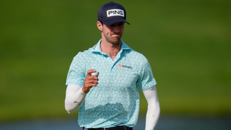 Alex Smalley waves on the 10th green during the third round of the PGA Championship golf tournament at Aronimink Golf Club, Saturday, May 16, 2026, in Newtown Square, PA. (Matt Slocum/AP)