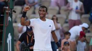 Felix Auger-Aliassime of Canada celebrates after winning the second round men's singles tennis match against Roman Andres Burruchaga of Argentina at the French Open tennis tournament in Paris, Thursday, May 28, 2026. (Thibault Camus/AP)