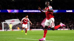 Arsenal's Bukayo Saka celebrates after scoring the opening goal during a Champions League semifinal, second leg, soccer match between Arsenal FC and Atletico Madrid in London, Tuesday, May 5, 2026. (John Walton/PA via AP)