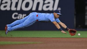 Toronto Blue Jays infielder Andres Gimenez misses a ground ball off the bat of Pittsburgh Pirates outfielder Bryan Reynolds during first-inning action in Toronto on Saturday, May 23, 2026. (Jon Blacker/CP)