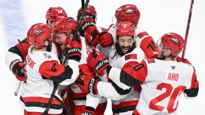 Carolina Hurricanes' Andrei Svechnikov (37) celebrates with teammates after scoring the game winning goal against the Montreal Canadiens during OT of Game 3 of the NHL Eastern Conference final Stanley Cup playoff series in Montreal on Monday, May 25, 2026. (Graham Hughes/CP)