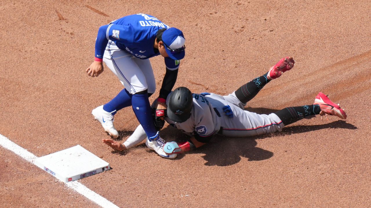 Okamoto shakes off HBP to power Blue Jays to tense win over Marlins