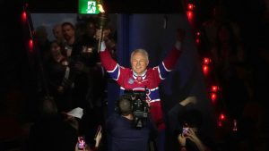 Former Montreal Canadiens player Claude Lemieux enters the arena during the pregame prior to first period of Game 3 of the NHL Eastern Conference final Stanley Cup playoff series against the Carolina Hurricanes, in Montreal, Monday, May 25, 2026. (Christinne Muschi/CP)