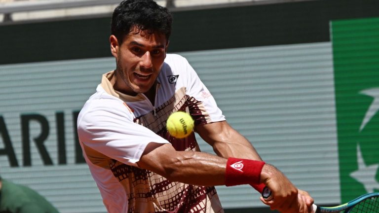 Adolfo Daniel Vallejo of Paraguay returns to Moise Kouame of France during their second round men's singles match at the French Open in Paris, Thursday, May 28, 2026. (Emma Da Silva/AP)