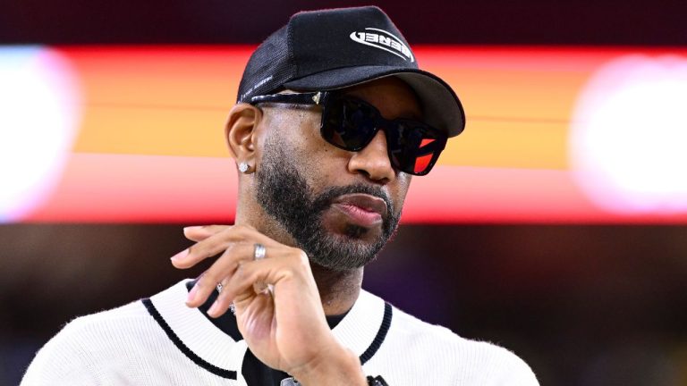 Basketball Hall of Famer Tracy McGrady stands on the sideline prior an NFL game between the Houston Texans and the Buffalo Bills, Nov. 20, 2025, in Houston. (Maria Lysaker/AP)