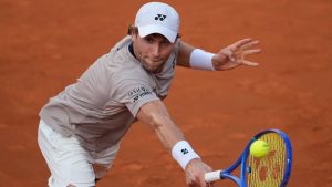 Casper Ruud of Norway returns a ball to Luciano Darderi of Italy during their semifinal match at the Italian Open in Rome, Friday, May 15, 2026. (Andrew Medichini/AP)