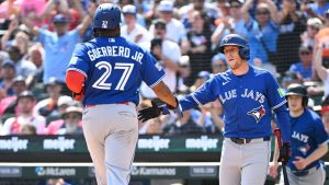 Toronto Blue Jays' Vladimir Guerrero Jr., left, is congratulated by Myles Straw after scoring a run during the 10th inning of a baseball game against the Detroit Tigers, Saturday, May 16, 2026, in Detroit. (Jose Juarez/AP)