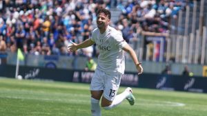 Napoli's Amir Rrahmani celebrates after scoring during the Serie A soccer match between Pisa and Napoli in Pisa, Italy, Sunday May 17 2026. (AP Photo/Alessandro La Rocca)